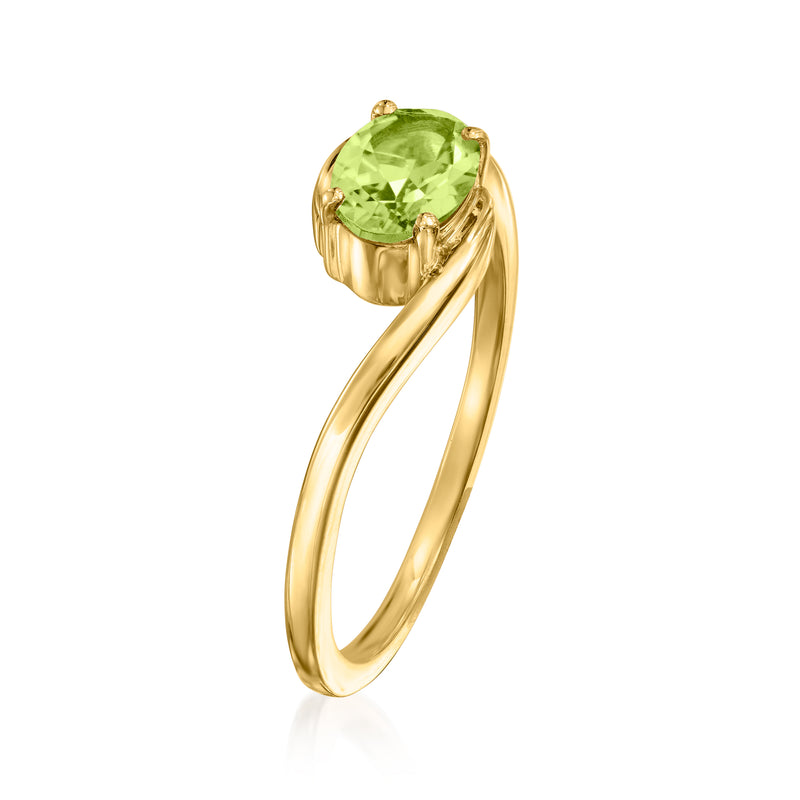 14kt yellow gold peridot ring, oval green gemstone in claw setting