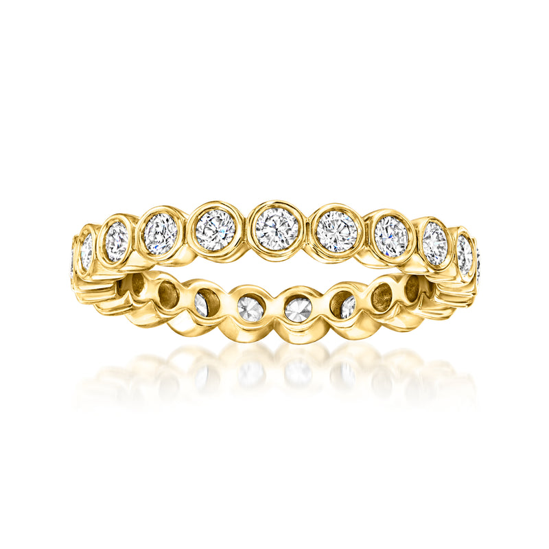 Gold eternity band with bezel-set round lab diamonds, scalloped prong frames