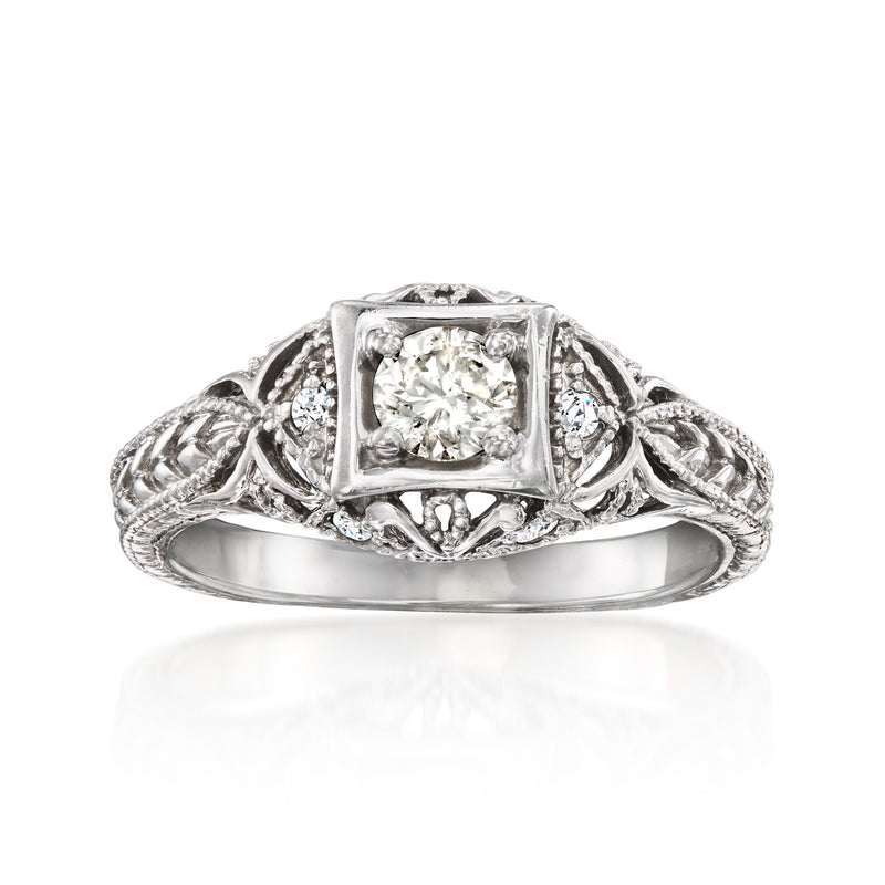 Vintage diamond filigree ring in 14kt white gold with square center stone