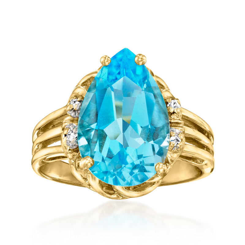 10kt yellow gold ring with large oval sky blue topaz and small diamond side accents