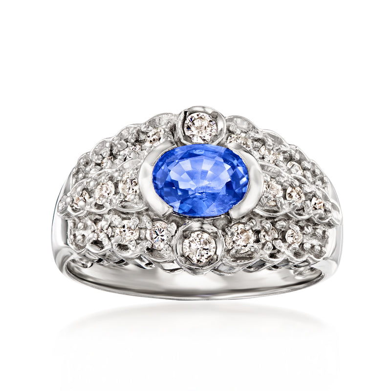 Platinum vintage ring with oval blue sapphire and diamond halo, size 7.25