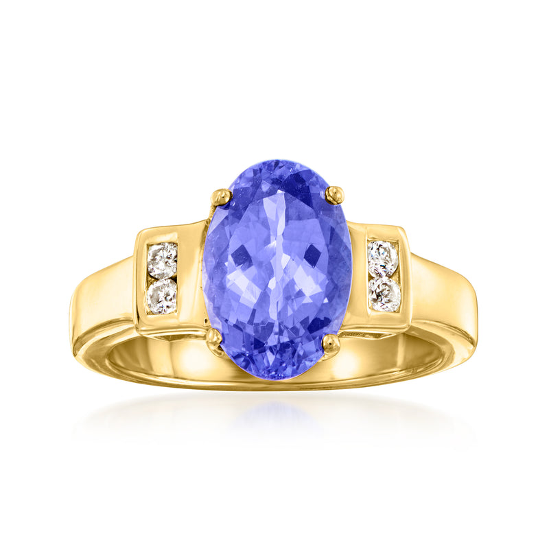 14kt yellow gold ring with large oval tanzanite and four square diamond accents
