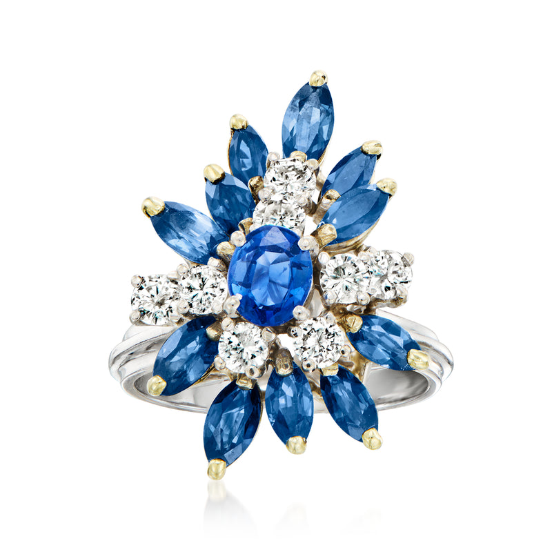 Vintage sapphire and diamond cluster ring, oval blue center with round white stones; 14kt white gold