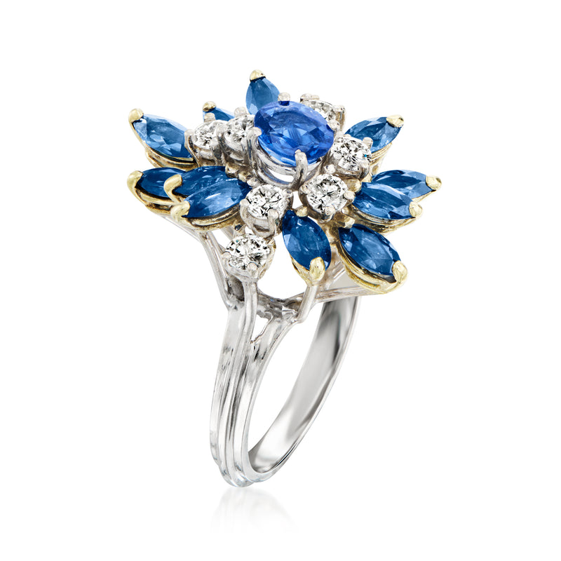 Sapphire and diamond cluster ring in 14kt white gold, blue marquise and round stones in prongs