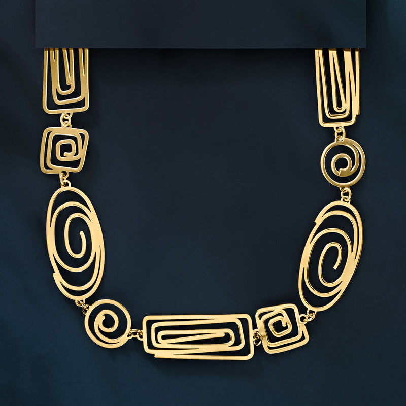 Gold spiral openwork necklace close-up with geometric square and spiral links