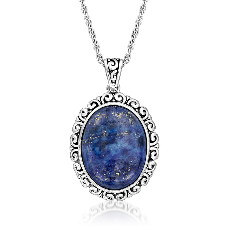 Sterling silver pendant necklace with oval blue lapis centerpiece and ornate filigree frame.