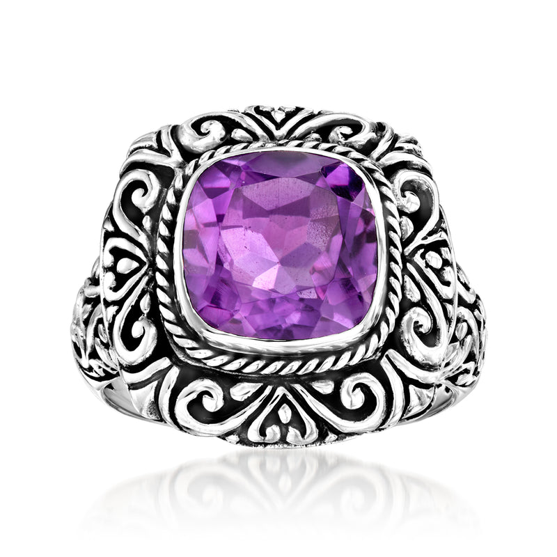 Sterling silver Bali-style ring with oval amethyst gemstone and ornate engraved band