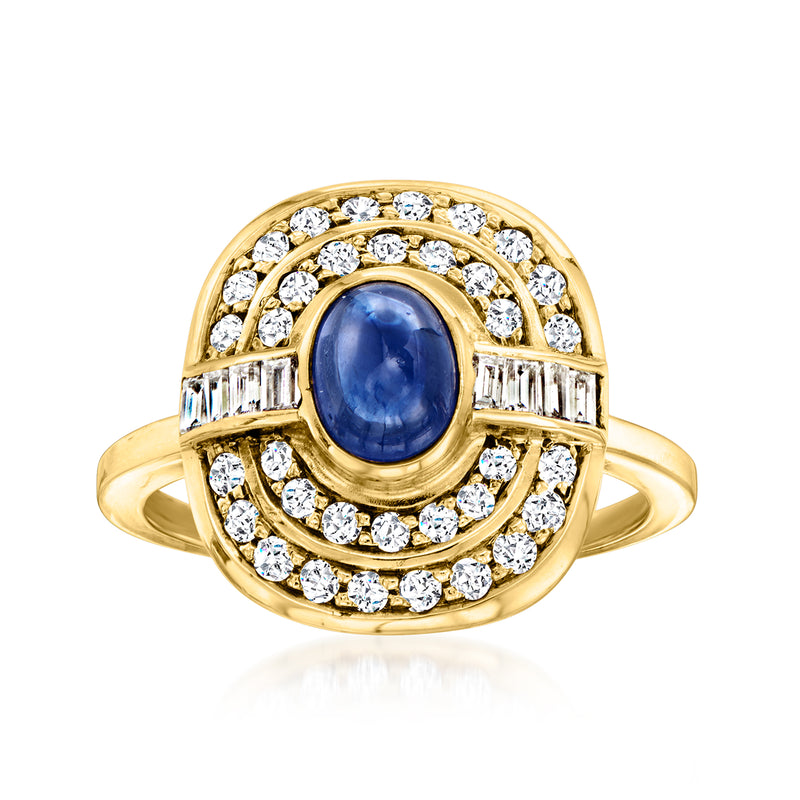 18k yellow gold ring with oval blue sapphire and round diamond halo, baguette side stones