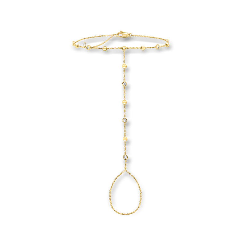 14kt yellow gold beaded hand chain bracelet with teardrop diamond drop