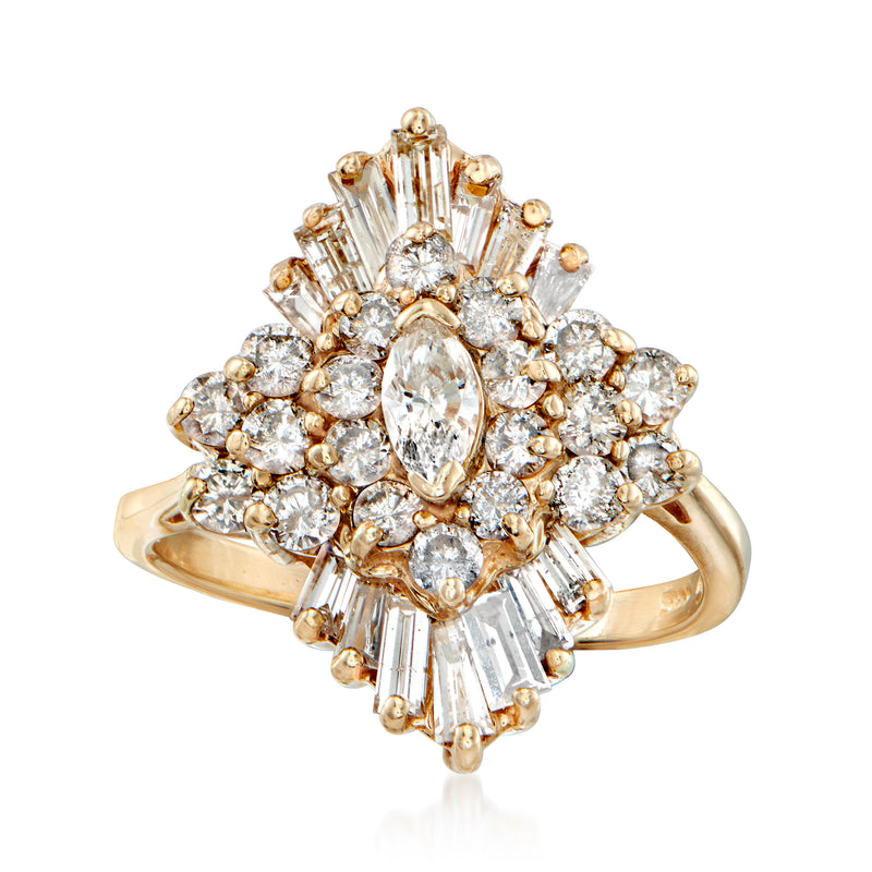 14kt yellow gold diamond cluster ring with oval center and baguette & round stones