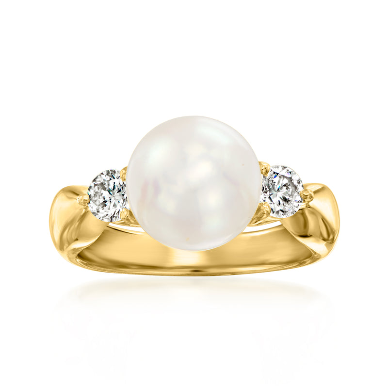 Vintage 18kt yellow gold ring with round cultured pearl and three diamond accents
