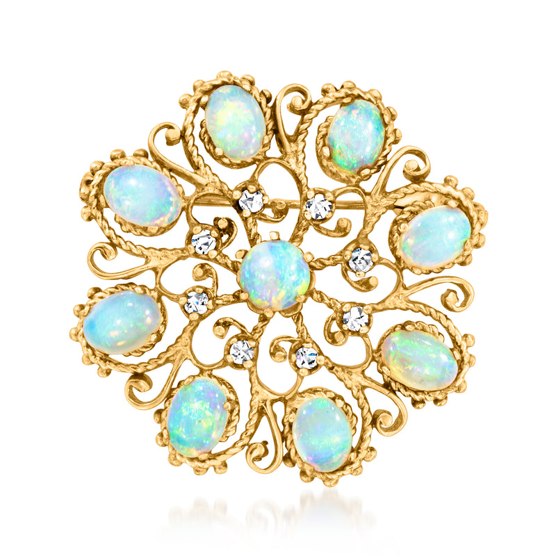 Vintage gold openwork pin with oval opal cabochons and small diamond accents