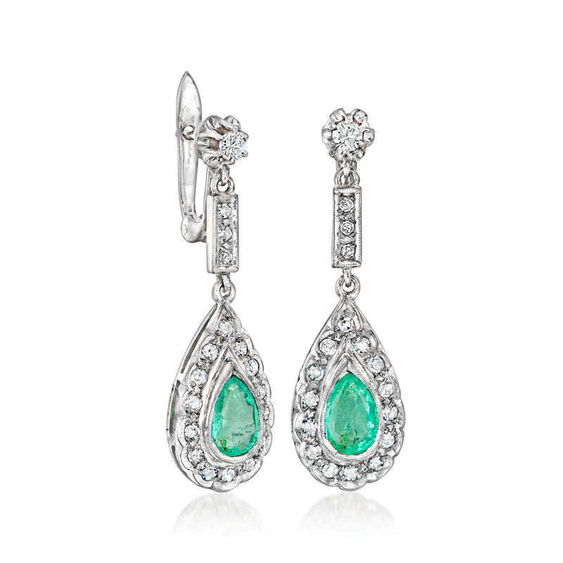 White gold teardrop earrings with green emerald center and diamond halo, post backs