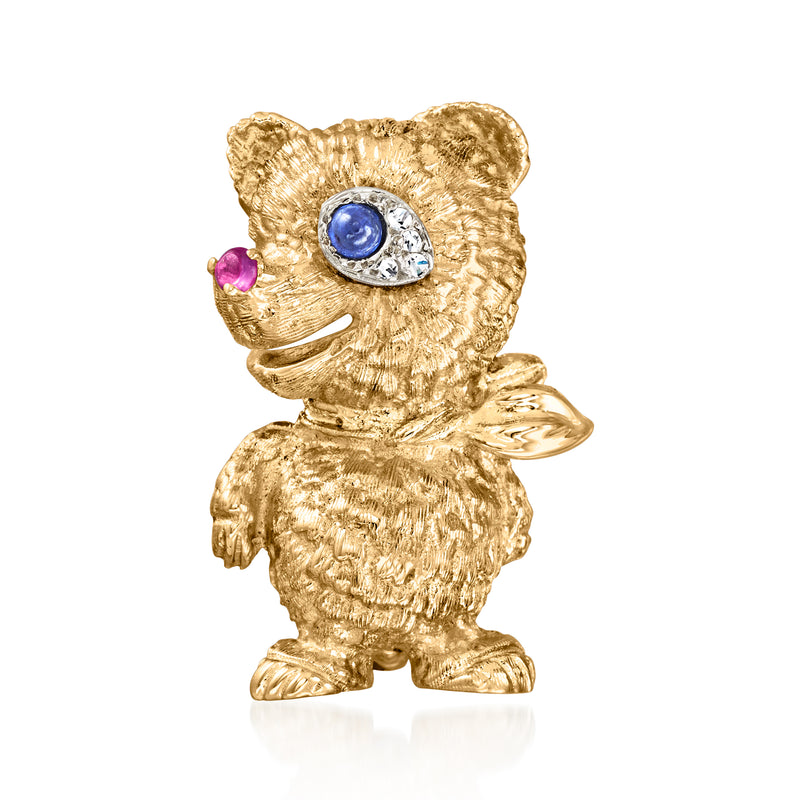 Vintage gold teddy bear pin with blue sapphire-style and purple accents