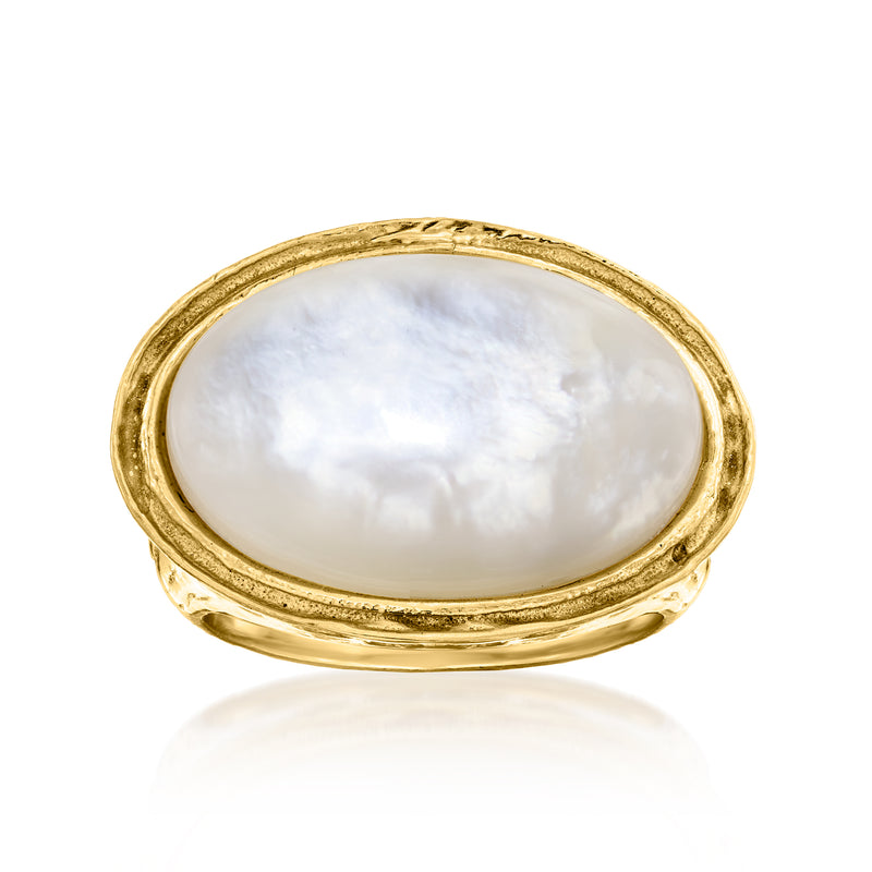 Oval mother-of-pearl cabochon ring with gold-tone bezel setting