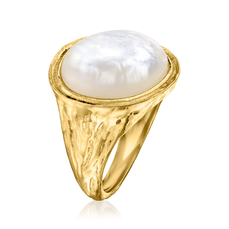 Oval mother-of-pearl cabochon ring with gold-tone openwork band