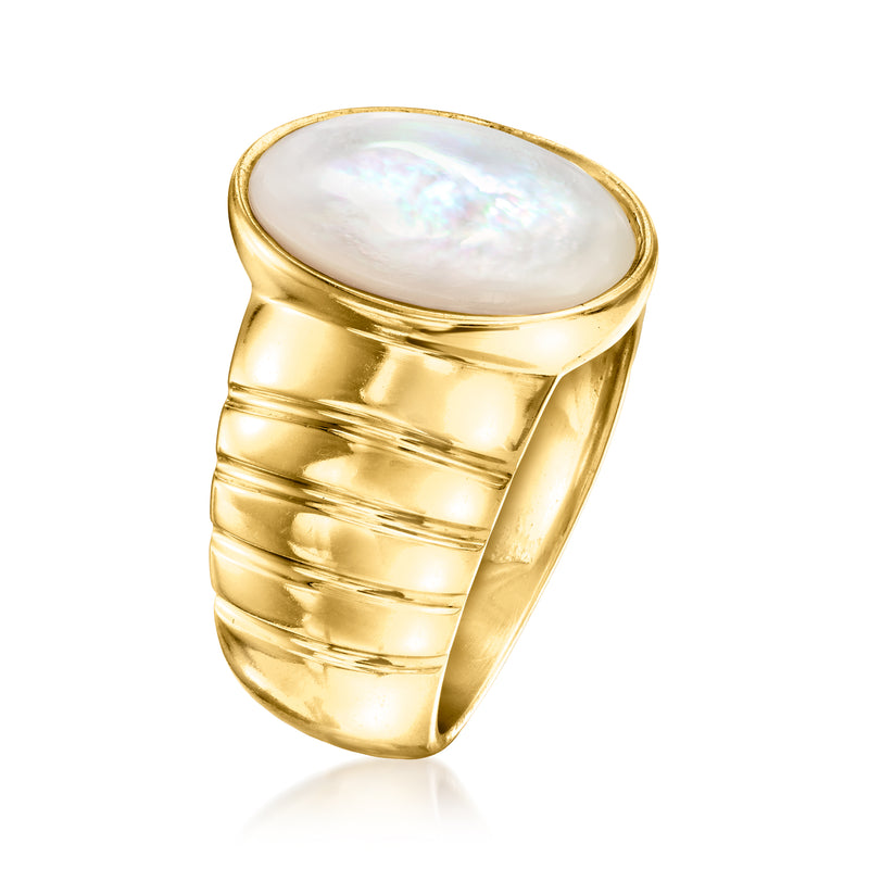 Oval mother-of-pearl ring in gold over sterling with ribbed band and bezel setting
