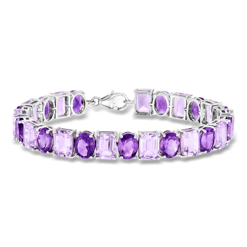 Sterling silver amethyst tennis bracelet with purple oval and baguette stones