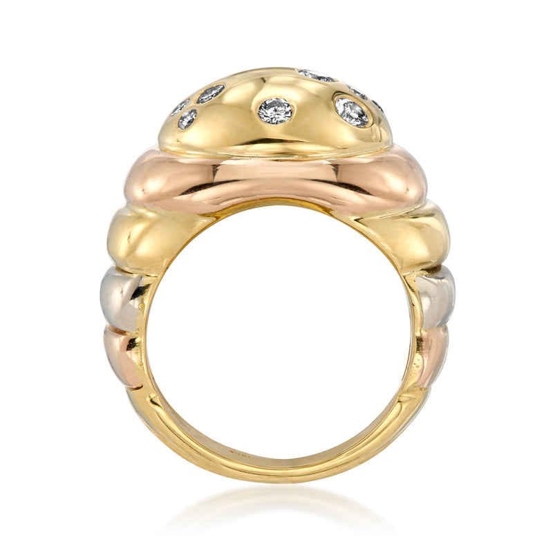 Tri-color gold dome ring with round diamond cluster on top, front open profile