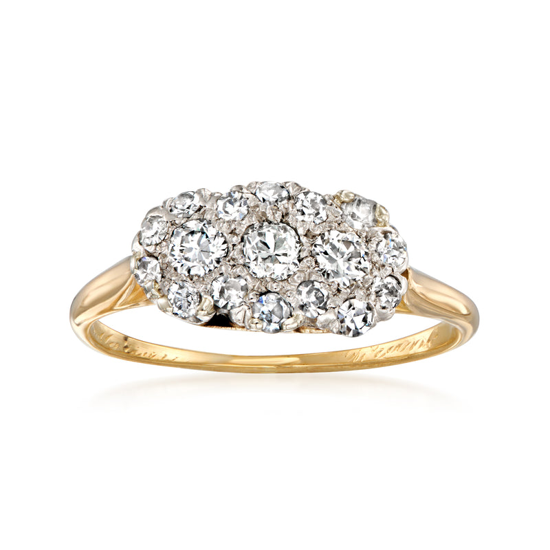 Vintage diamond cluster ring with round stones, platinum setting and 18k yellow gold band