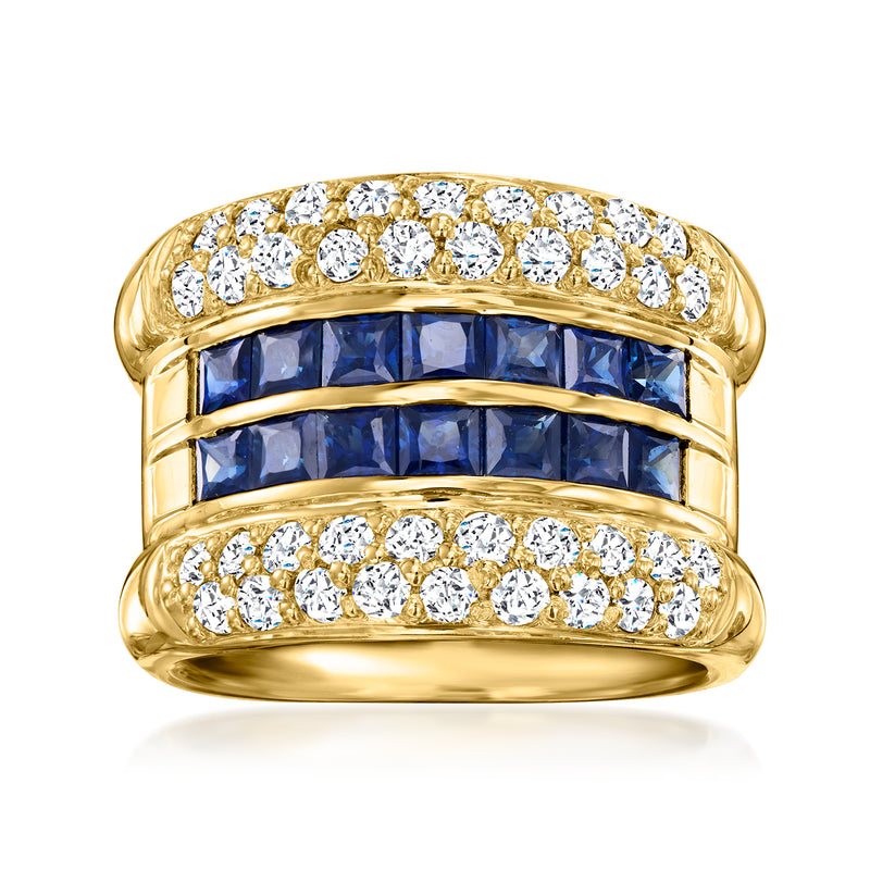 18kt yellow gold ring with blue sapphire center and diamond three-row detailing