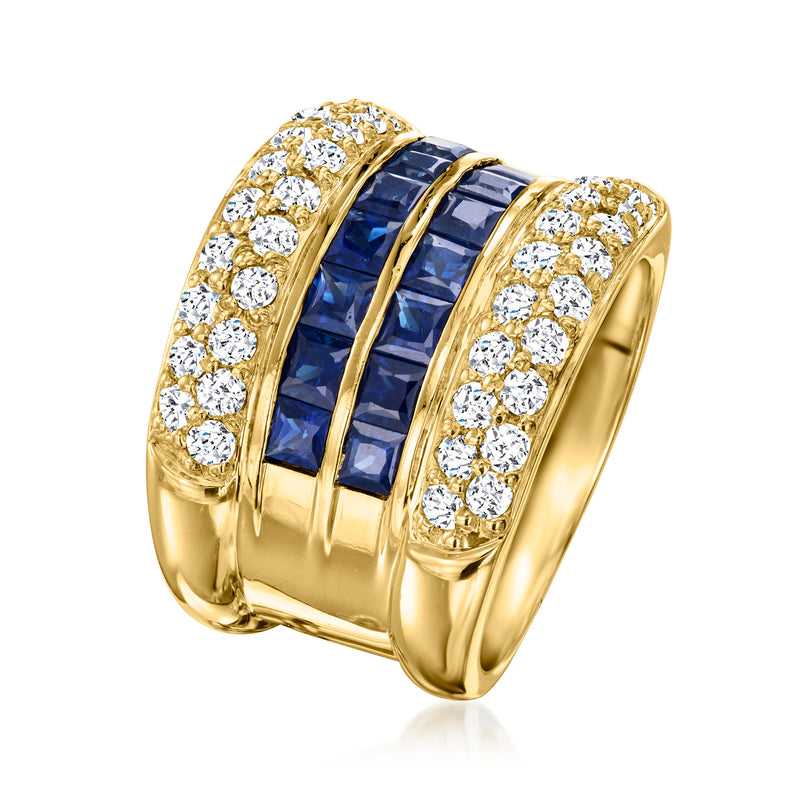 18kt yellow gold ring with channel-set blue sapphires and diamond side borders