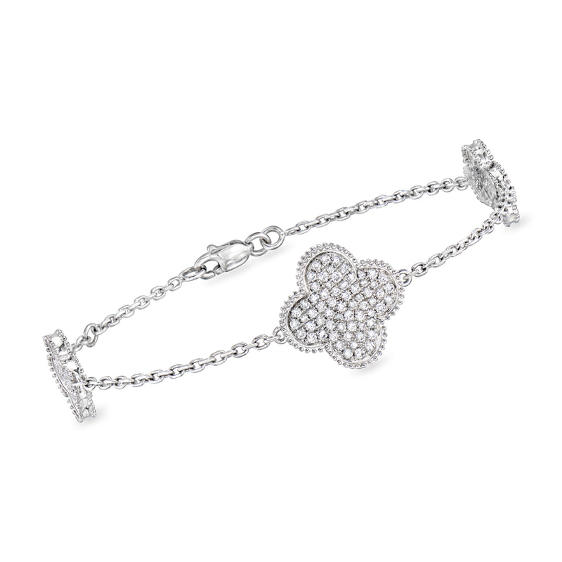 White gold diamond clover station bracelet with linked chain and sparkling details