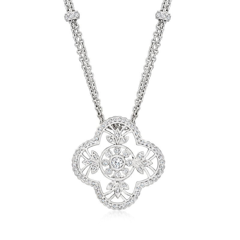Diamond floral openwork pendant necklace in white gold with round quatrefoil design