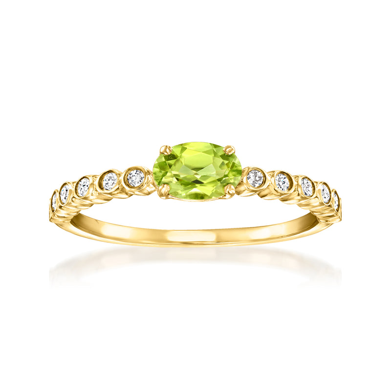 14kt yellow gold ring with oval peridot center and round diamond accents