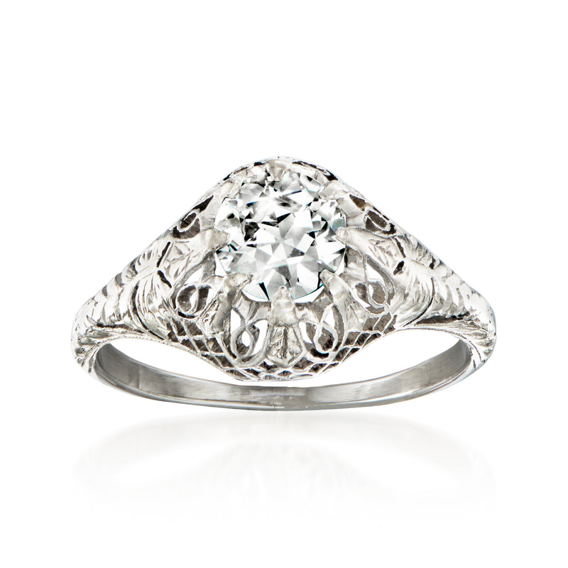 Platinum vintage diamond filigree ring with round-center diamond