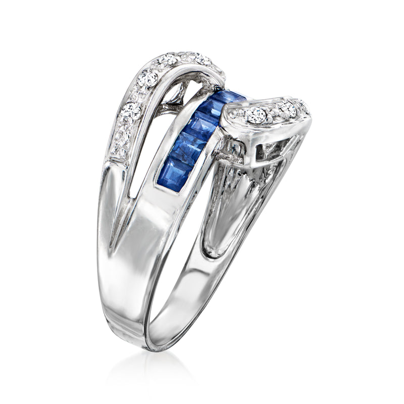 Sapphire and diamond ring, 18kt white gold with blue rectangular center and round diamond halo