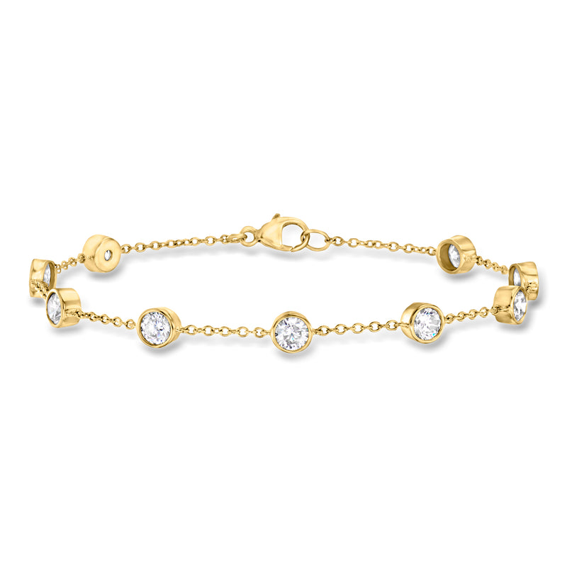 18kt gold over sterling CZ station bracelet, round bezel-set stones, lobster clasp