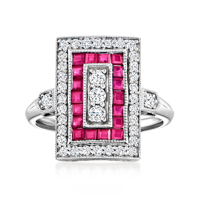 Vintage platinum ring with pink ruby center and diamond halo, with baguette accents