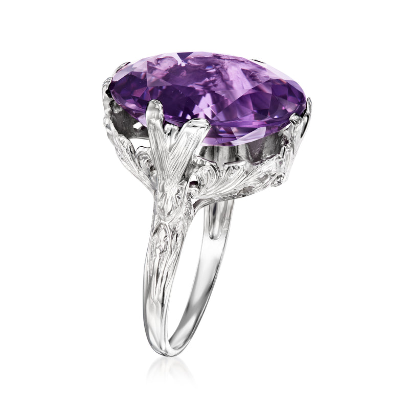 Amethyst oval gemstone ring in white gold with carved gallery and side prongs.