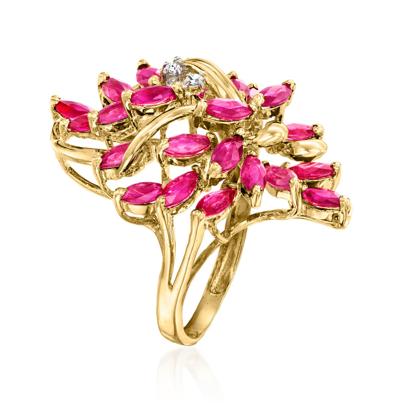 14kt yellow gold ring with oval pink ruby stones and small diamond accents