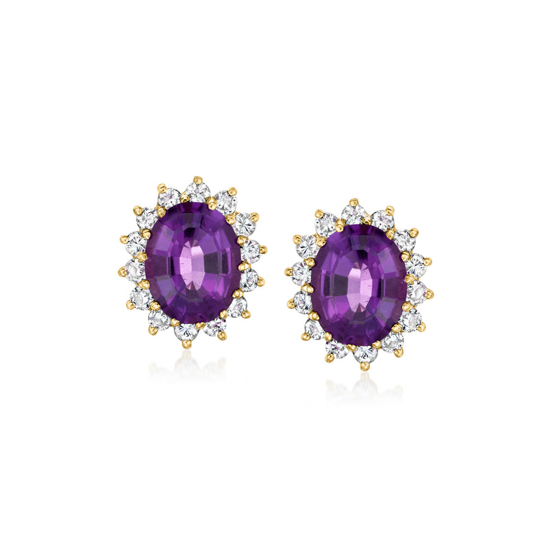 Oval amethyst cluster clip earrings in 14kt yellow gold with diamond halo, bezel setting.