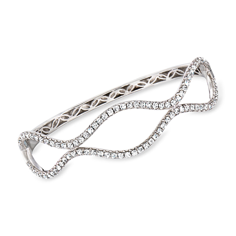 18kt white gold wave bangle with diamond accents and open lattice, hinged bracelet