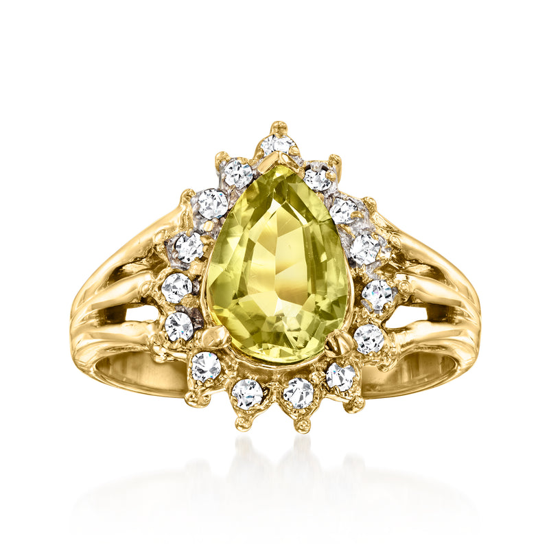 Vintage 14k yellow gold ring with pear green tourmaline center and diamond halo