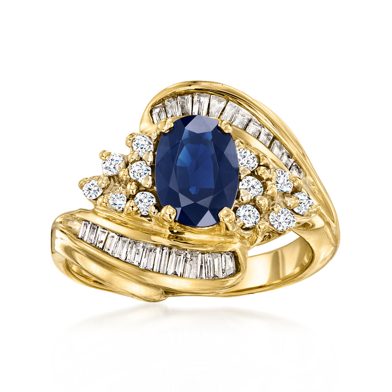 14k yellow gold swirl ring with oval sapphire and diamond accents