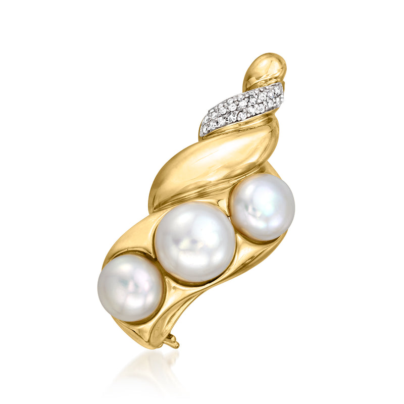 Gold seashell pin with three white cultured pearls and a small diamond-studded band