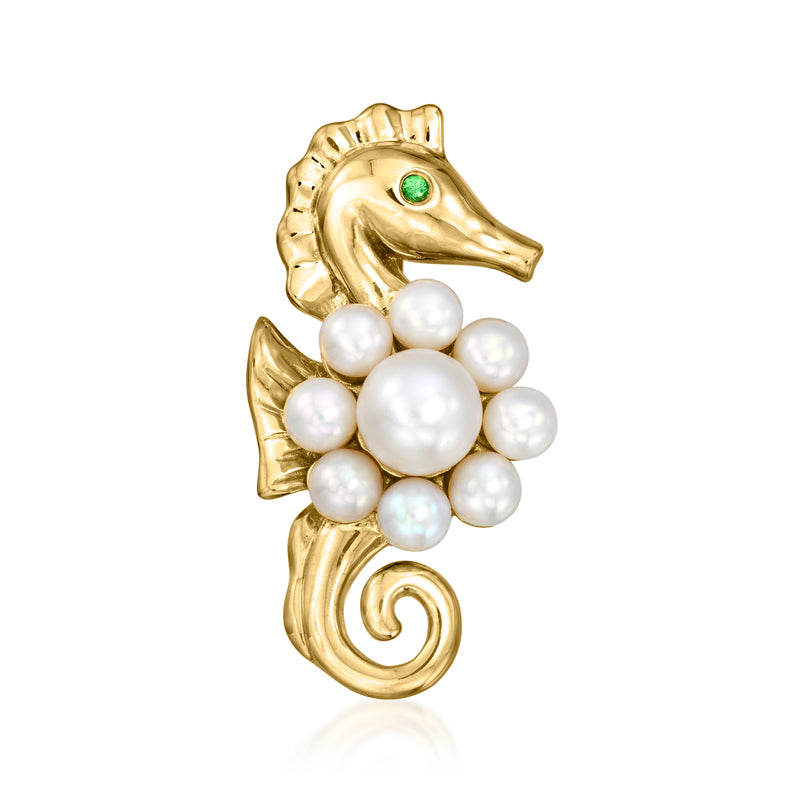 Gold-tone seahorse pin with clustered cultured pearls and green gemstone eye