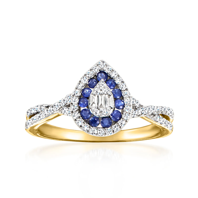 Vintage yellow gold ring with oval blue sapphire cluster and diamond halo