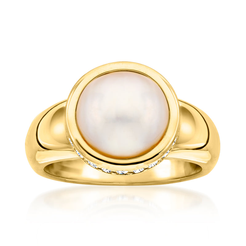 Gold-tone mabe pearl and CZ halo ring, round bezel with curved band