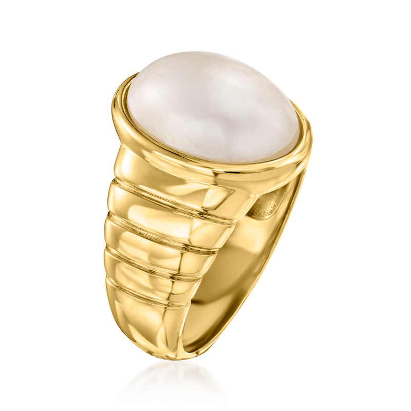 Gold mabe pearl ring, angled view, oval pearl in polished gold bezel