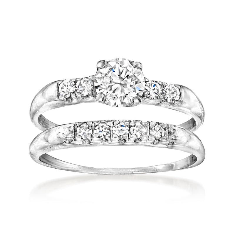 Vintage diamond bridal set with round center stone and matching band