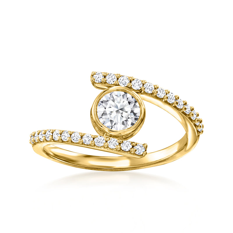 14kt yellow gold bypass ring with round bezel center diamond and pave accents