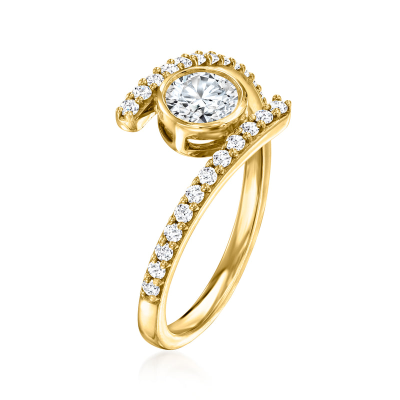 14kt yellow gold bypass ring with round bezel center diamond and pave detail