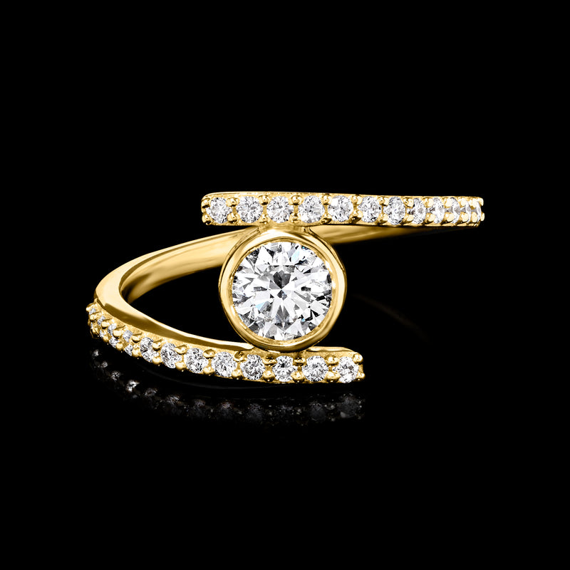 14kt yellow gold bypass ring with round center diamond and pave bands