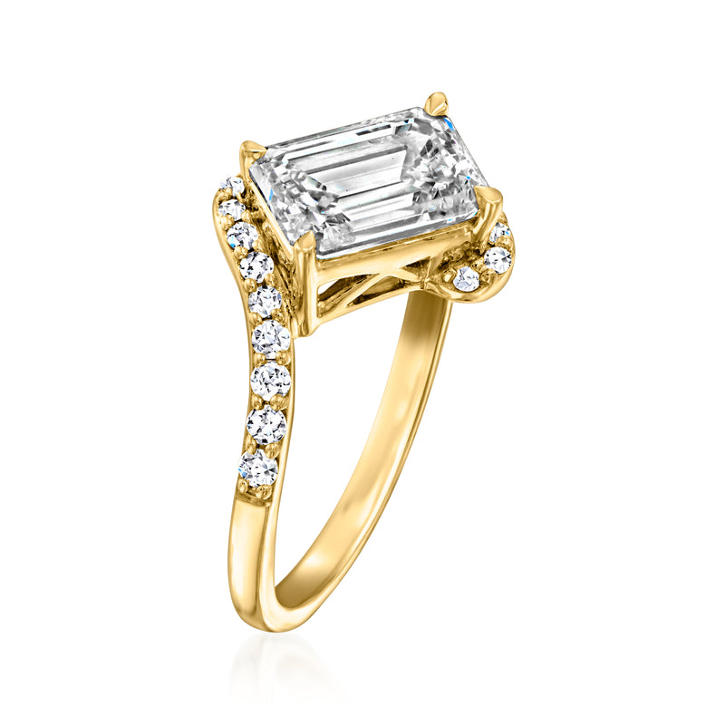 14kt yellow gold ring with emerald-cut lab-grown diamond center and diamond side clusters