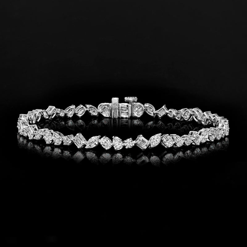 Diamond bracelet featuring multi-shaped clear stones in white gold